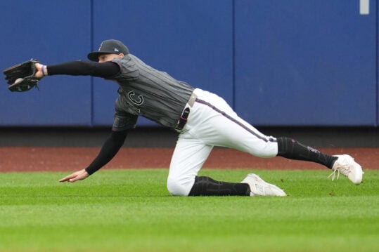 Aug 17, 2024; New York City, New York, USA; New York Mets left fielder Brandon Nimmo (9) makes a diving catch during the game against the Miami Marlins at Citi Field. Mandatory Credit: Lucas Boland-USA TODAY Sports