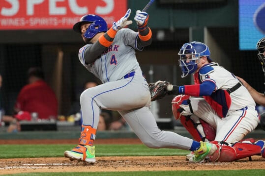 Jun 17, 2024; Arlington, Texas, USA; New York Mets catcher Francisco Alvarez (4) follows through on his RBI single against the Texas Rangers during the sixth inning at Globe Life Field. Mandatory Credit: Jim Cowsert-USA TODAY Sports