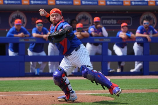 New York Mets catcher Francisco Alvarez (4) picks up a bunt and throws out Detroit Tigers centerfielder Parker Meadows in the fourth inning at Clover Park