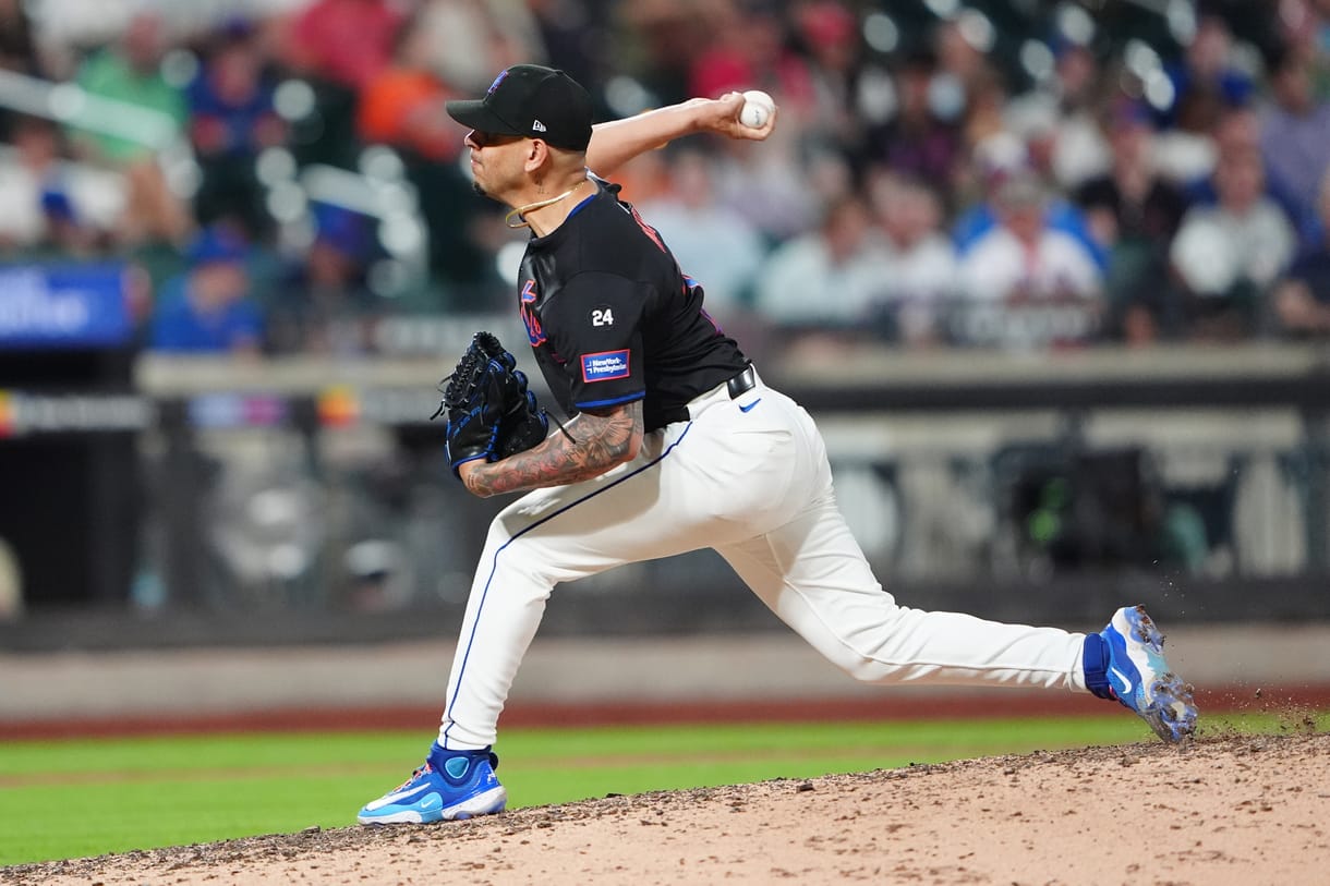 Jul 10, 2024; New York City, New York, USA; New York Mets pitcher Jose Butto (70) delivers a pitch against the Washington Nationals during the eighth inning at Citi Field. Mandatory Credit: Gregory Fisher-USA TODAY Sports